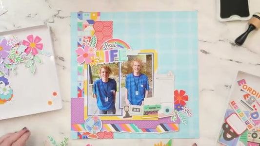 Colorful L-shape scrapbook layout featuring patterned paper strips, die cut embellishments, and photos arranged in an L composition using February 2026 Hip Kits